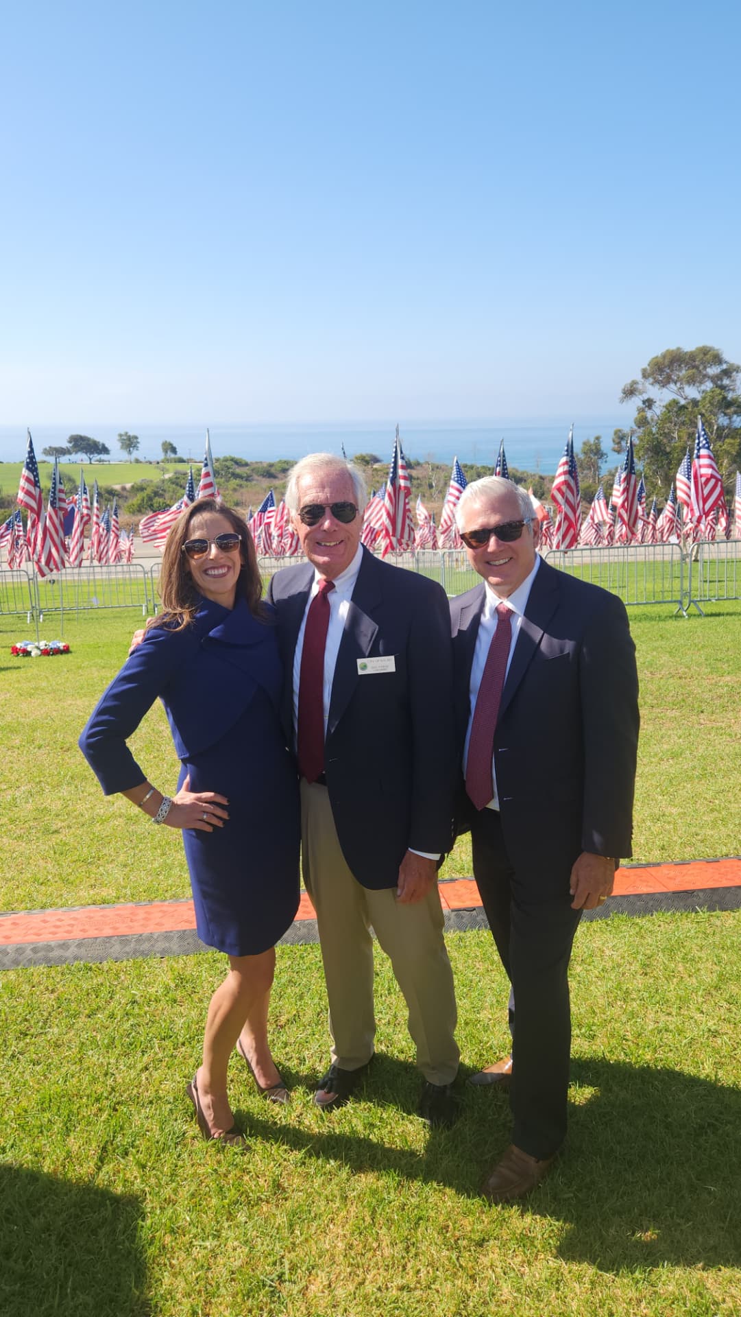 Doug Stewart with Pepperdine University Senior Vice President and Chief Operating Officer Nicolle Taylor and Executive Vice President Phil Phillips